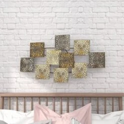 Metal Sunburst Carved Wall Decor Gold - Olivia & May -Olivia & May GUEST 0d576f00 c31f 45a4 8a20 6bc66e3518a0