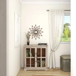 22"x22" Metal Starburst Wall Clock Brown - Olivia & May -Olivia & May GUEST 0e684663 ec2b 451c acfa 888be9cbc139