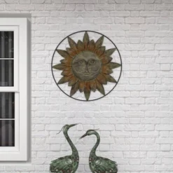 Metal Sunburst Indoor Outdoor Wall Decor With Distressed Copper Like Finish Brown - Olivia & May -Olivia & May GUEST 1707ffe5 d35b 403c 9fe0 bbb4415d4338