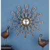 22"x22" Metal Starburst Wall Clock Brown - Olivia & May -Olivia & May GUEST 2174b88e c3b8 4f84 8238 b3a458fc4ab6