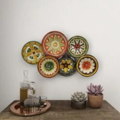 Metal Plate Wall Decor With Spanish Designs Black - Olivia & May -Olivia & May GUEST 3159a210 bd0c 4e11 988d 9d4136aed54e