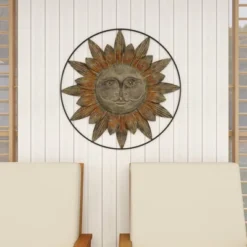 Metal Sunburst Indoor Outdoor Wall Decor With Distressed Copper Like Finish Brown - Olivia & May -Olivia & May GUEST 44e10a01 3d56 4f52 90bf 01e841ca0d70