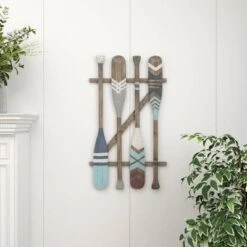 Coastal Wood Paddle Wall Decor With Arrow And Stripe Patterns - Olivia & May 35 Coastal Wood Paddle Wall Decor With Arrow And Stripe Patterns - Olivia & May -Olivia & May GUEST 57bad9b4 c4cf 4250 9cb2 1d3b800ee6bc