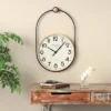 28"x17" Wooden Suspended Hanging Wall Clock, Silent Mechanism - Olivia & May: Grand Hotel Paris Design