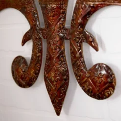 Metal Fleur De Lis Wall Decor With Perforated Details Brown - Olivia & May -Olivia & May GUEST 9430345c 1b1d 44fc 90b8 52cfe3dc2879