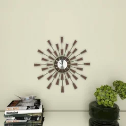 22"x22" Metal Starburst Wall Clock Brown - Olivia & May -Olivia & May GUEST f789b114 bc94 480d 8b15 63cb27aa33d0